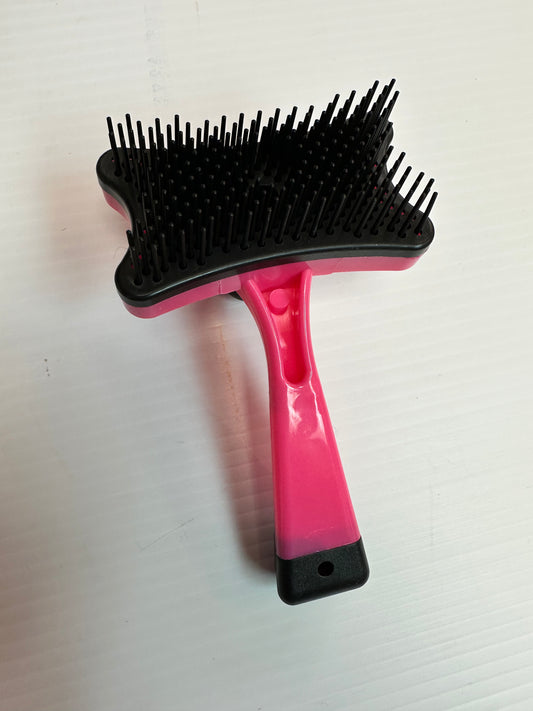 Brosse autonettoyante pour chat et chien